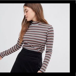 Divided turtleneck striped Sweater. Size 2